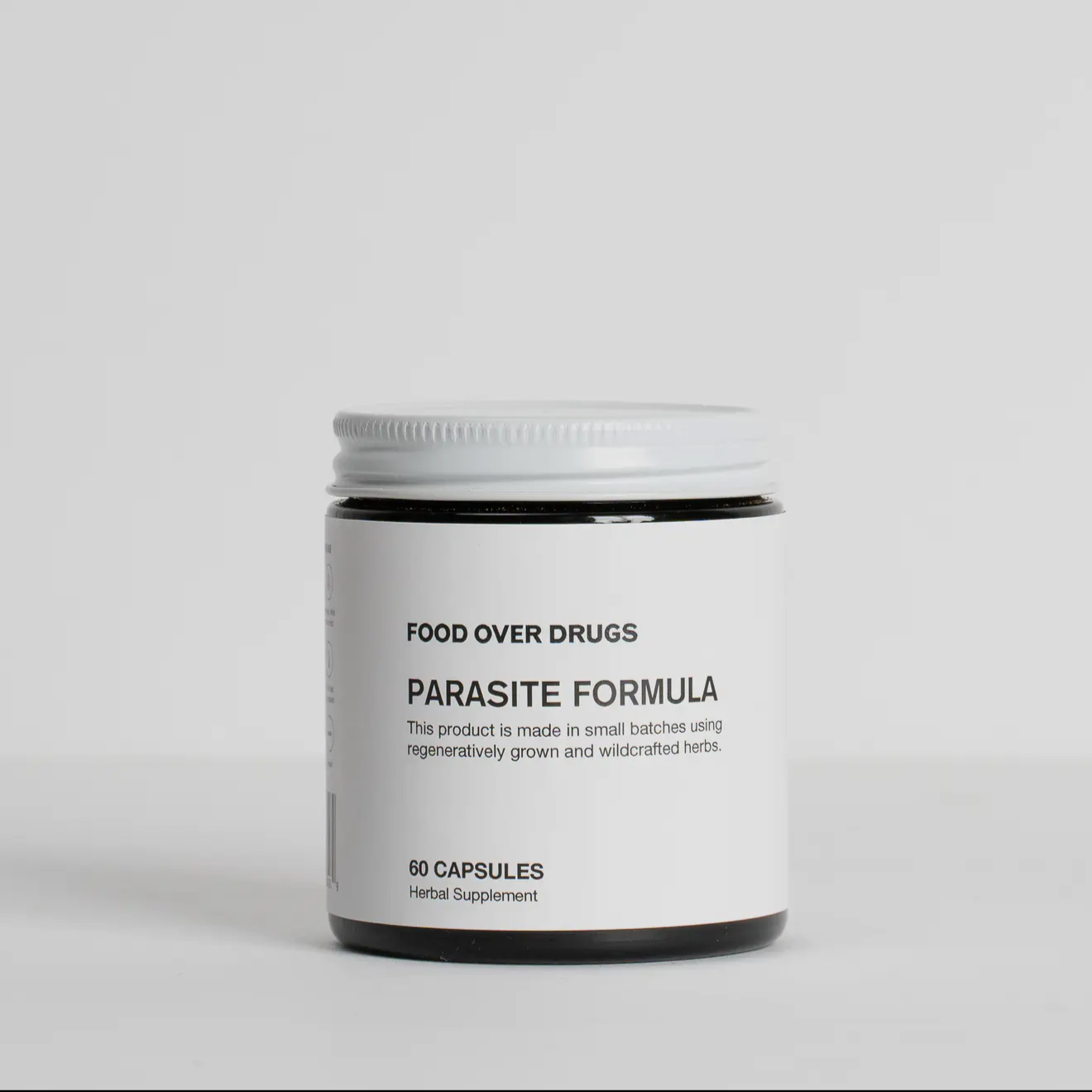 Container labeled 'Parasite Formula' on a white background